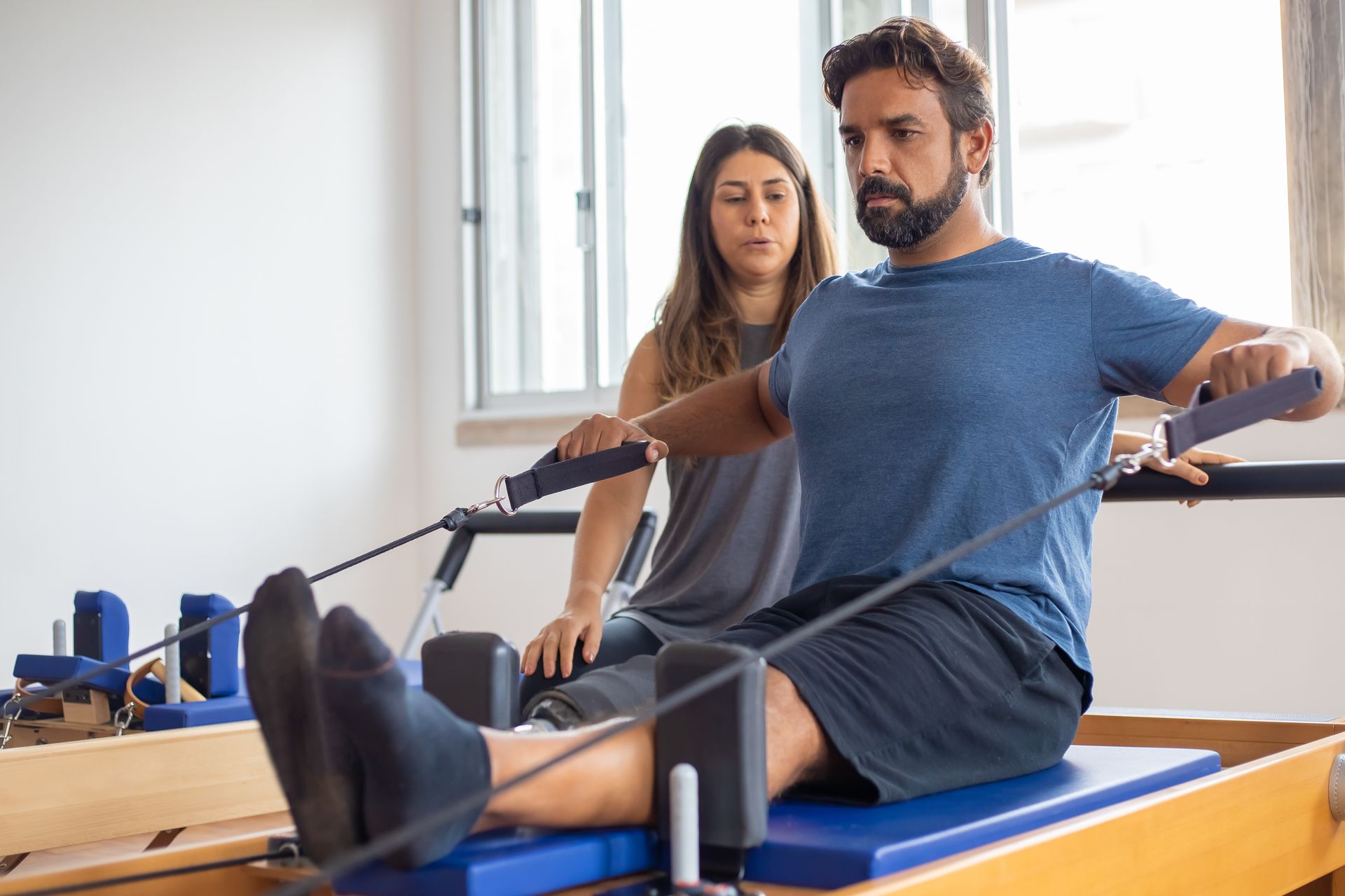 Person experiencing knee pain while walking